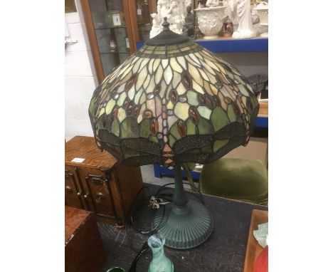 Tiffany style lamp, the stained glass shade with dragonfly motif, approximately 62cm high
