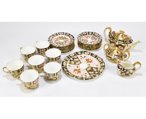 ROYAL CROWN DERBY; a twenty-five part tea service decorated in the 2451 Imari pattern.Additional InformationLight wear to the