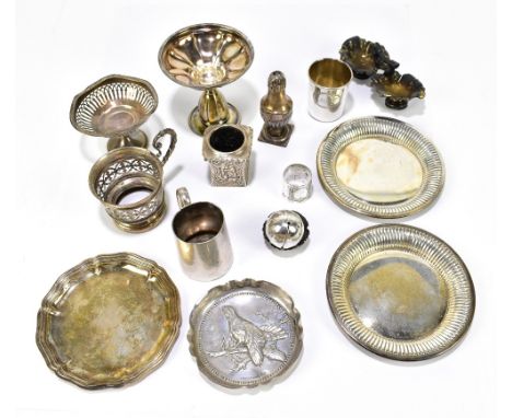 A quantity of white metal including German silver and other items including a single candlestick, small dish embossed with a 