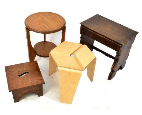 A 1930s oak side table, together with an oak stool, a nest of two graduated oak coffee tables and a modern ply wood coffee ta