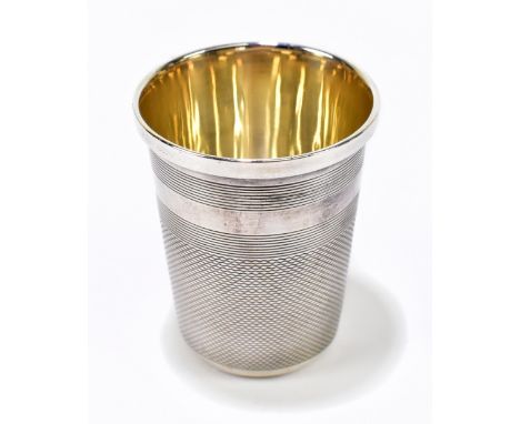 FRANCIS HOWARD; an Elizabeth II hallmarked silver shot glass in the form of a thimble, with engine turned decoration, Sheffie