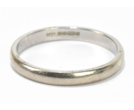An 18ct white gold wedding band, size V, approx weight 4.2g.Additional InformationLight scratches, wear to the band, thinning