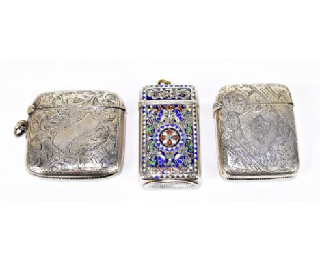 A 925 grade enamel decorated vesta case of rounded rectangular form, 55 x 32.5mm, and two hallmarked silver vesta cases of ro