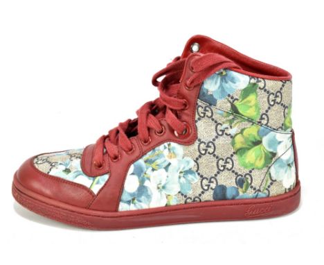 GUCCI; a pair of Supreme leather GG Bloom flower high top sneakers with front lacing and red leather detail, with original au