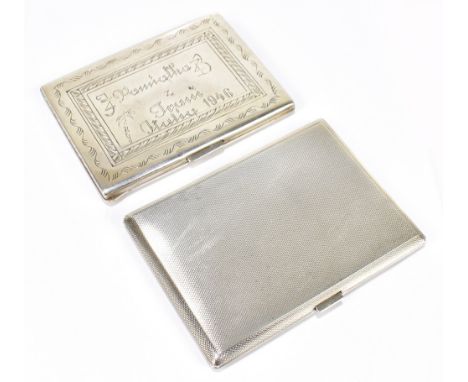 A George VI hallmarked silver cigarette case, with engine turned detailing, weight 4.9ozt/154g, length 11.5cm, with a Contine