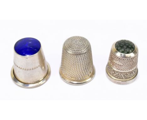 JAMES SWANN &amp; SON; a George VI hallmarked silver thimble inset with moss agate, together with two further hallmarked silv