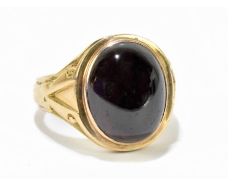 A 15ct yellow gold and garnet cabochon ring, size K, approx 7.5g.Additional InformationVery minor scratch to the surface of t