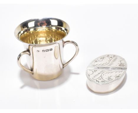 WILLIAM AITKEN; a George V hallmarked silver miniature tyg, Birmingham 1911, height 4cm, together with sterling silver twin s