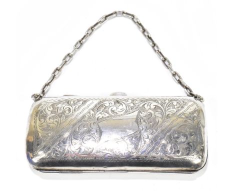 An Edward VII hallmarked silver purse with engine turned and chased floral decoration surrounding a shaped vacant cartouche, 