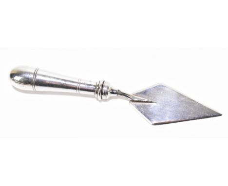 JOHN GRINSELL &amp; SONS; a Victorian hallmarked silver butter spreader in the form of a trowel, Birmingham 1884, length 15cm