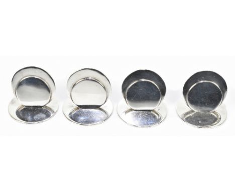 SAMPSON MORDAN &amp; CO; a set of four George V hallmarked silver menu holders, Chester 1911, approx weight 4.95o\t/154g (4).