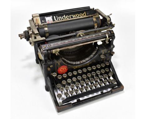 UNDERWOOD; a vintage black metal typewriter.