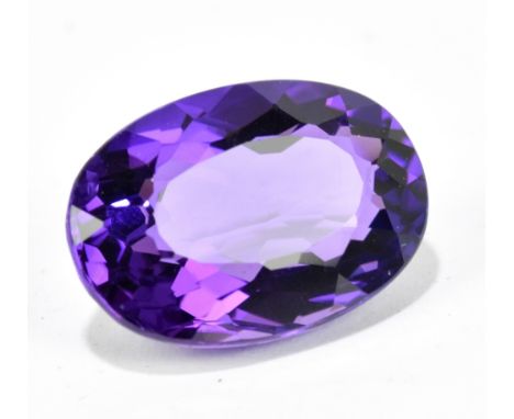 A loose amethyst 13.10ct, 13 x 19 x 8.5mm, dark purple oval facet clarity IF with origin detailed as Africa and no treatment.