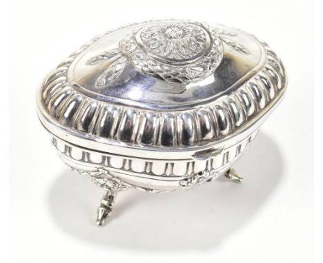 A German 925 standard oval sugar box, the hinged lid with embossed decoration, traces of gilded interior, swag motifs to the 
