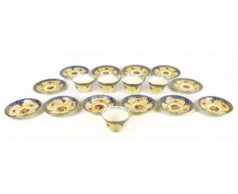 ROYAL WORCESTER; five hand painted and gilt decorated trios with floral detail, black printed marks to base, together with an