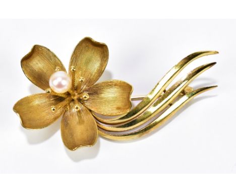 A 9ct yellow gold brooch in the form of a flowerhead centred with a cultured pearl, length 48mm, approx 5.5g.Additional Infor
