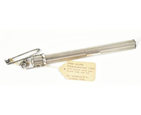SAMPSON MORDAN &amp; CO; an Edwardian hallmarked silver and engined turned thermometer sleeve with pull cap in hinged bracket