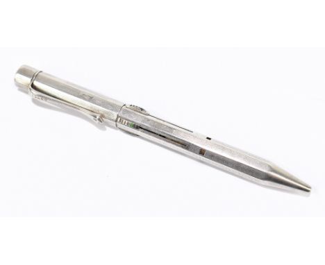 An imported sterling silver four colour pencil with engine turned decoration.Additional InformationInscribed 'patent ???' to 
