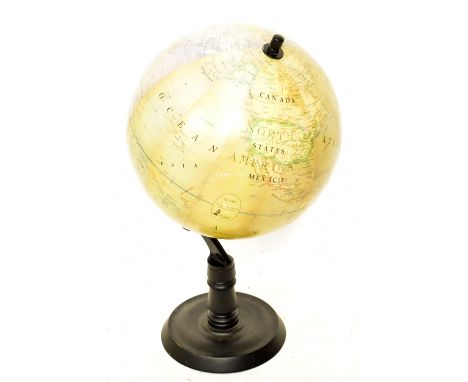 A modern Devine table globe, scale 1:30,000,000, height 75cm.