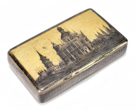 A mid 19th century Russian silver, silver gilt niello and engraved snuff box of rectangular form, both the hinged lid and bas