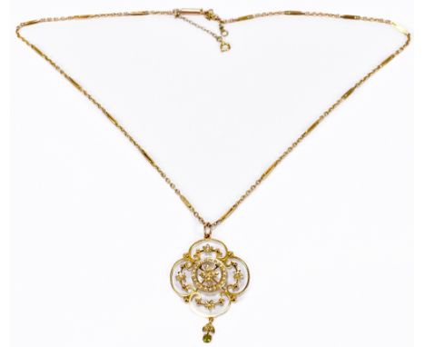 An Edwardian 9ct yellow gold and seed pearl pendant of pierced quatrefoil form and with lower drop set with a peridot, suspen