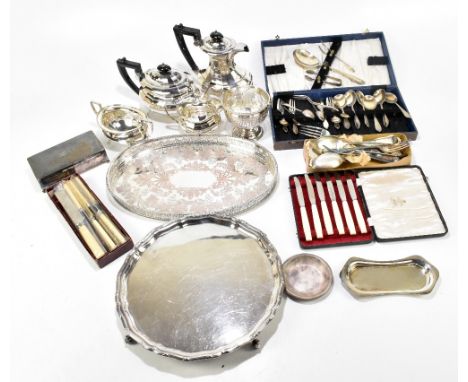 A small collection of assorted silver plate including a four piece tea service with panelled decoration, various trays, a cig