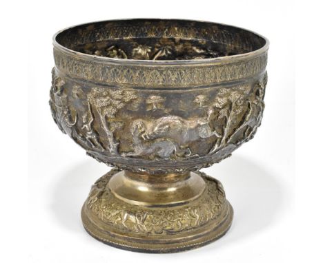 An Indian white metal pedestal bowl, with elaborate cast decoration of hunting scenes, height 20cm, approximate weight 30ozt/
