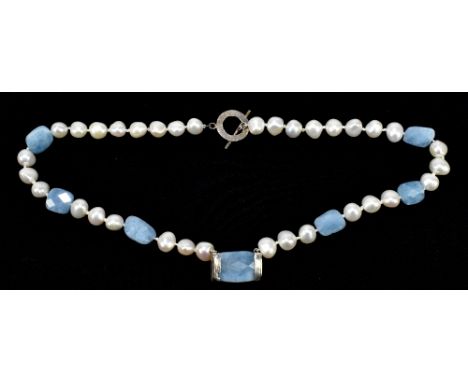 ANNE COLLIN; a silver baroque pearl and polished blue stone necklace, length 50cm, boxed.Additional InformationOverall in goo