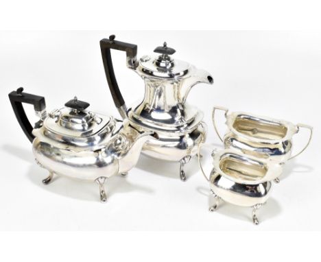 WALKER &amp; HALL; a George V hallmarked silver four piece tea service with cast shaped rim, Sheffield 1919, approx weight 63