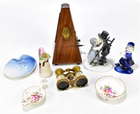A pair of French mother of pearl and lacquered brass opera glasses stamped 'Le Maire Paris', with a Pacquet metronome, a Bing