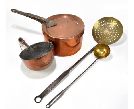 A large Victorian copper pan with wrought iron handle and associated lid, a copper bowl with turned beech handle and pinched 