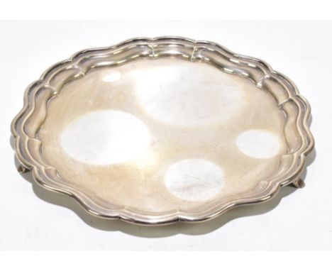 JOSEPH GLOSTER; a hallmarked silver salver, Birmingham 1937, weight 32ozt/1006g, diameter 35cm.Additional InformationLight ta