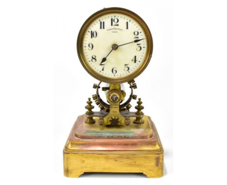 THE EUREKA CLOCK COMPANY LTD OF LONDON; an early electric clock with signed circular dial set with Arabic numerals above cent