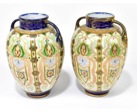 NORITAKE; a pair of twin handled hand painted vases with stylised floral decoration, height 17.5cm (2).Additional Information