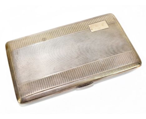 WT TOGHILL; a George VI hallmarked silver cigarette case of rectangular form with engine turned decoration, Birmingham 1939, 