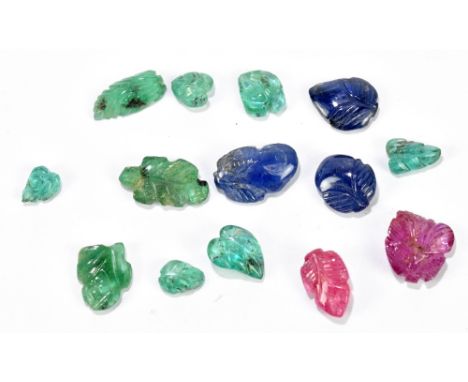 RUBY, SAPPHIRE &amp; EMERALD; a group of carved stones totalling 22.77ct.