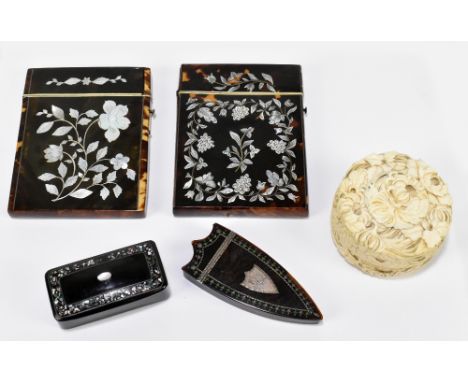 Two Victorian tortoiseshell card cases with mother of pearl inlaid decoration, together with a tortoiseshell shield shaped bo