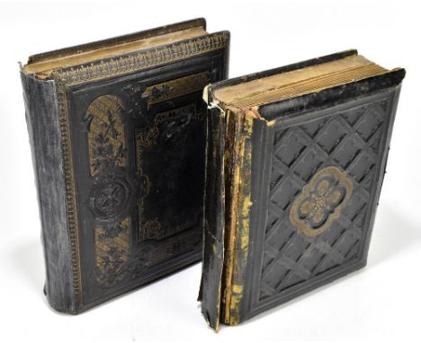 Two Victorian musical photograph albums, one example containing a selection of portrait photographs of children, gentlemen an