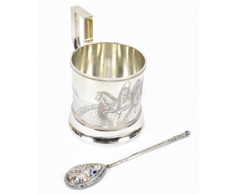 A Russian silver cup with chased decoration depicting a Troika sledge, impressed marks to the underside, engraved with initia