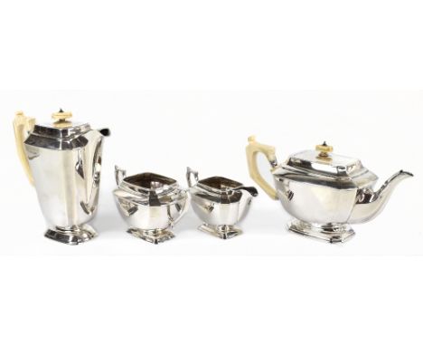 FRANK COBB &amp; CO LTD; a George V hallmarked silver four piece tea service in the Art Deco style, the teapot and water jug 