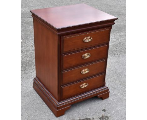 A reproduction mahogany bedside chest of four drawers, on bracket feet, height 75cm, width 52cm, depth 46cm.Additional Inform