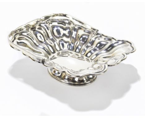 J. SHERWOOD &amp; SONS; a Edward VII hallmarked silver swing handled pedestal basket with cast panelled decoration, Birmingha