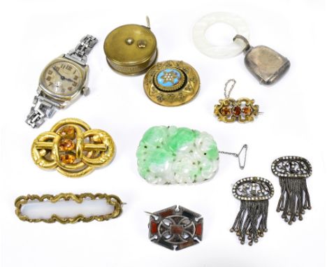 A collection of assorted costume jewellery including a Victorian mourning brooch with central enamelled panel and seed pearls