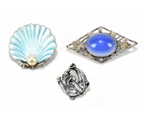 ATTRIBUTED TO BERNARD INSTONE; a sterling silver and pale blue enamel decorated scallop moulded brooch, width 25mm, a lozenge