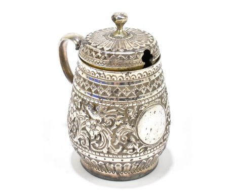 HOLLAND &amp; SON; a Victorian hallmarked silver mustard with cast decoration depicting birds in flight and scrolling foliate