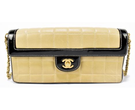 CHANEL; a vintage circa 2000 cream and black calfskin quilted with black patent trimmed 'Timeless Classic' single flap handba