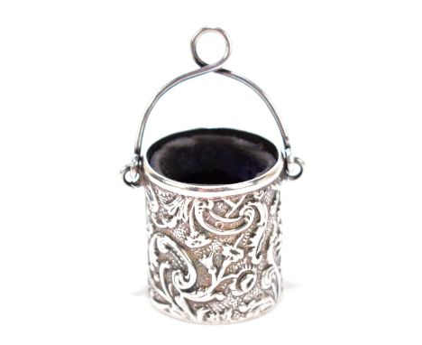 LAWRENCE EMANUEL; an Edward VII hallmarked silver thimble holder in the form of a bucket with repoussé scrolling decoration, 
