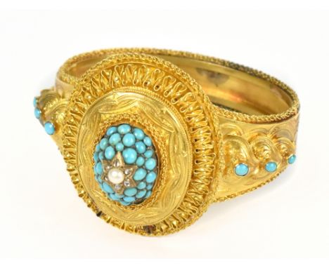 A yellow metal hinged snap bangle, the domed hinged locket cover set with turquoise beads centred with a pearl amongst tiny r