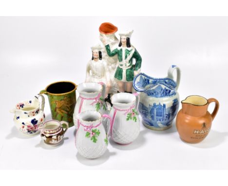 A mixed lot of ceramic jugs together with a Staffordshire flat back, height approx 38cm (9).Additional InformationWear and ch