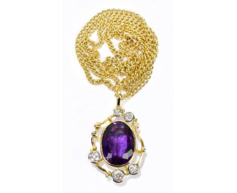 MARTIN WHITE OF TETBURY; an 18ct yellow gold amethyst and diamond set pendant suspended on a 18ct yellow gold flat link chain